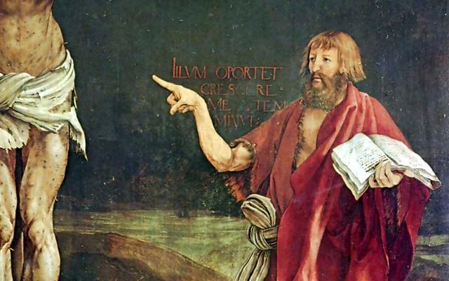Der lange Finger des Johannes im Bild des Isenheimer Altars.