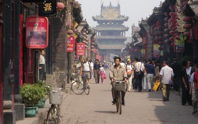 Chinese auf einem Fahrrad